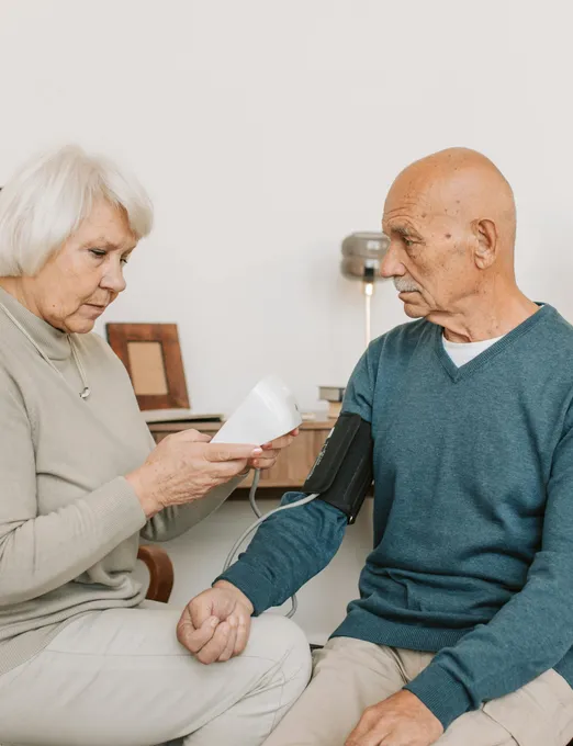 Family caregiver reviewing care details and household support