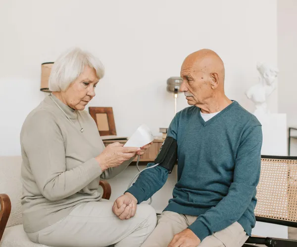 Family caregiver coordinating household support and appointments